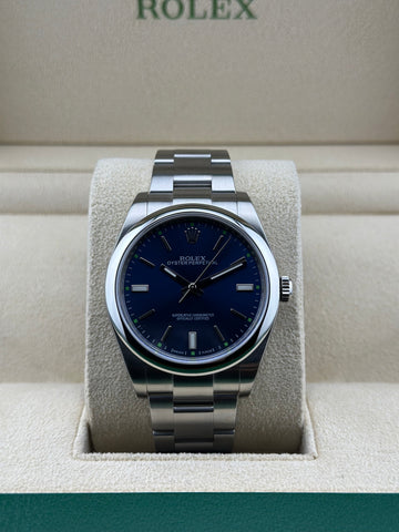 Rolex Steel Oyster Perpetual 39mm Blue Smooth Oyster 114300